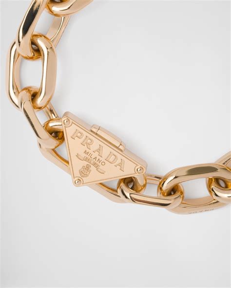 prada gold bracelet.